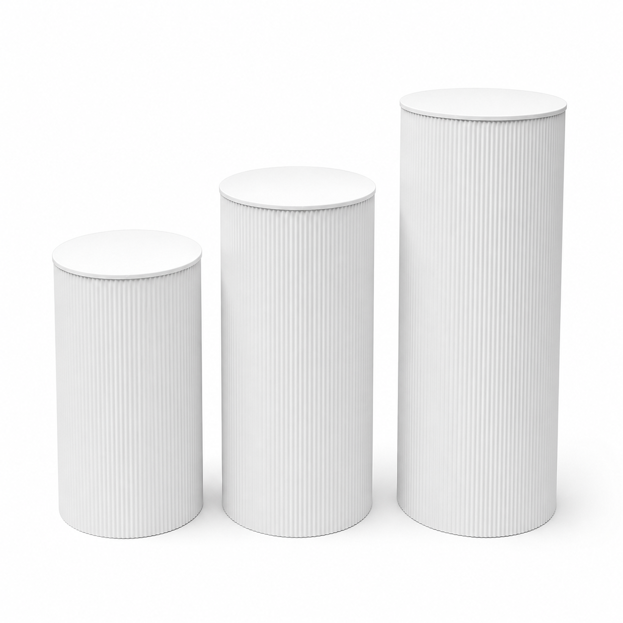 White fluted metal display plinth set of three on white background